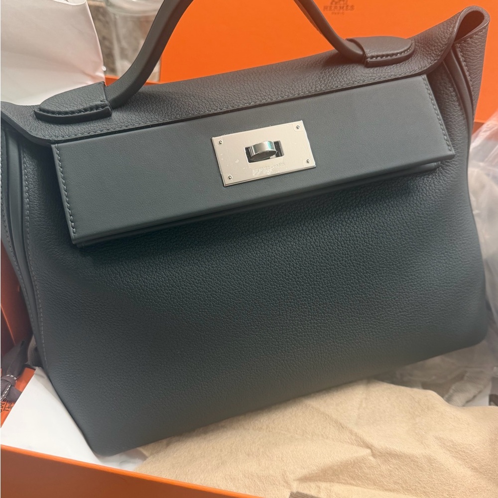 24/24 size 29 Hermes Black Top Handle Satchel with Silver Hardware.